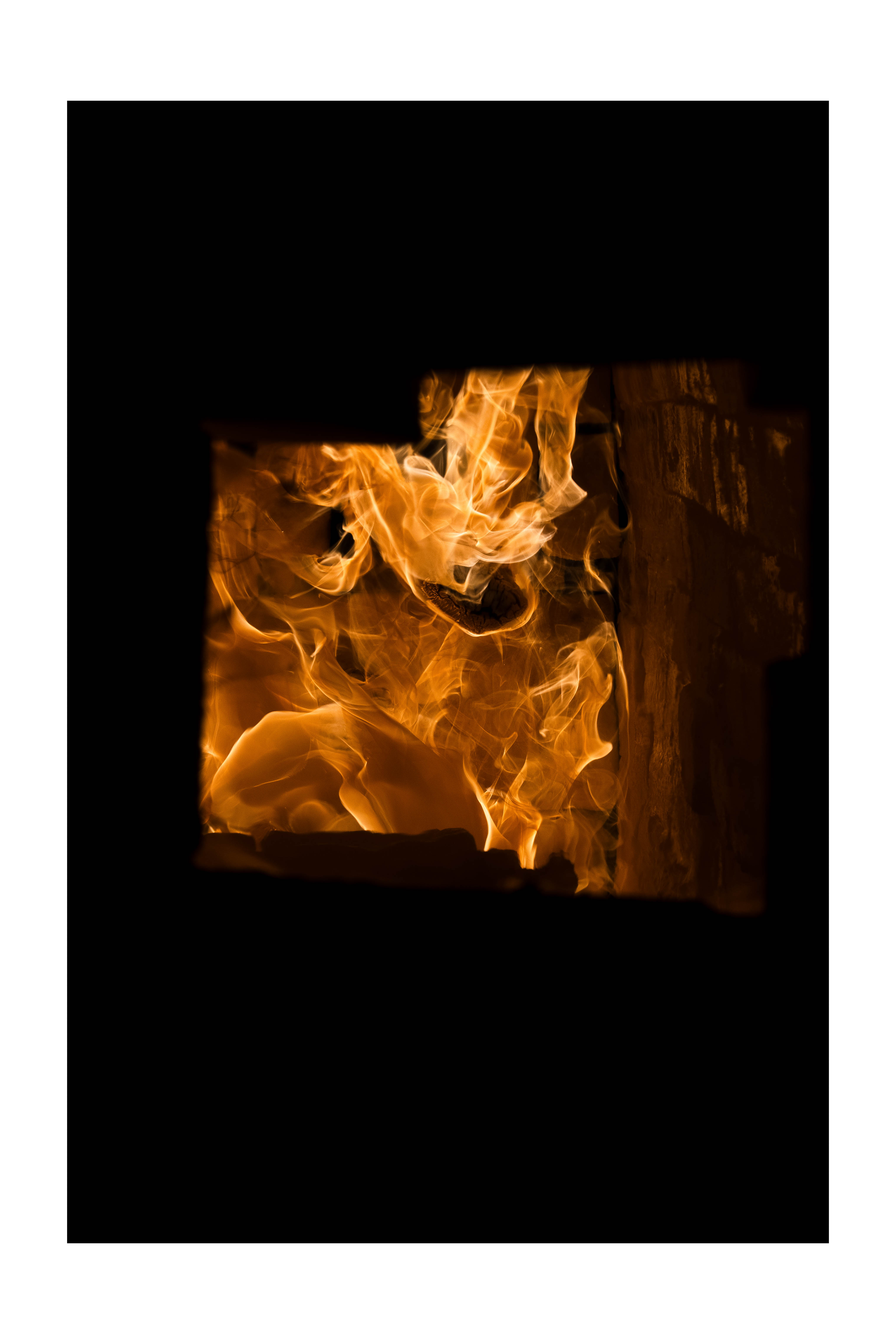 Flames burning inside a kiln